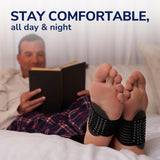 Black adjustable arch support sleeve on barefoot foot with cushioned heel pad