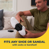 Black arch support sleeve on foot, cushioned arch pad and textured non-slip base