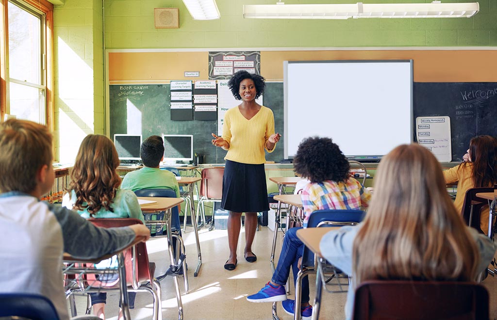 Stylish Step 16 Hour Insole Woman Teaching in Front of Class