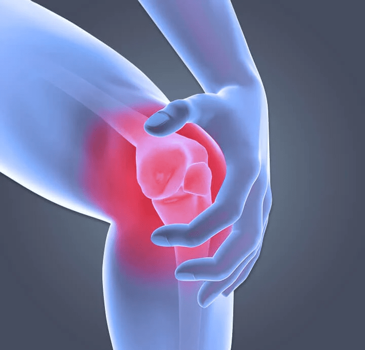 Image showing a person holding knee due  to knee pain. 